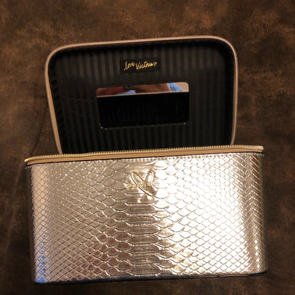 Gold Victoria’s Secret makeup bag